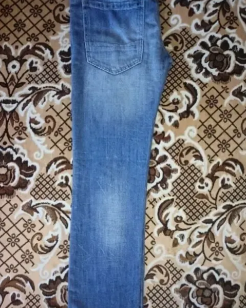 Джинсы Benetton.