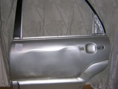 Дверь КИА-Спортейдж 2009года с накладками