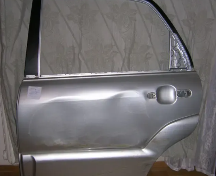 Дверь КИА-Спортейдж 2009года с накладками