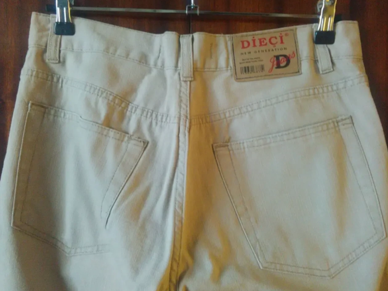 Новые мужские джинсы - 2 dvd диска с фильмами в подарок.