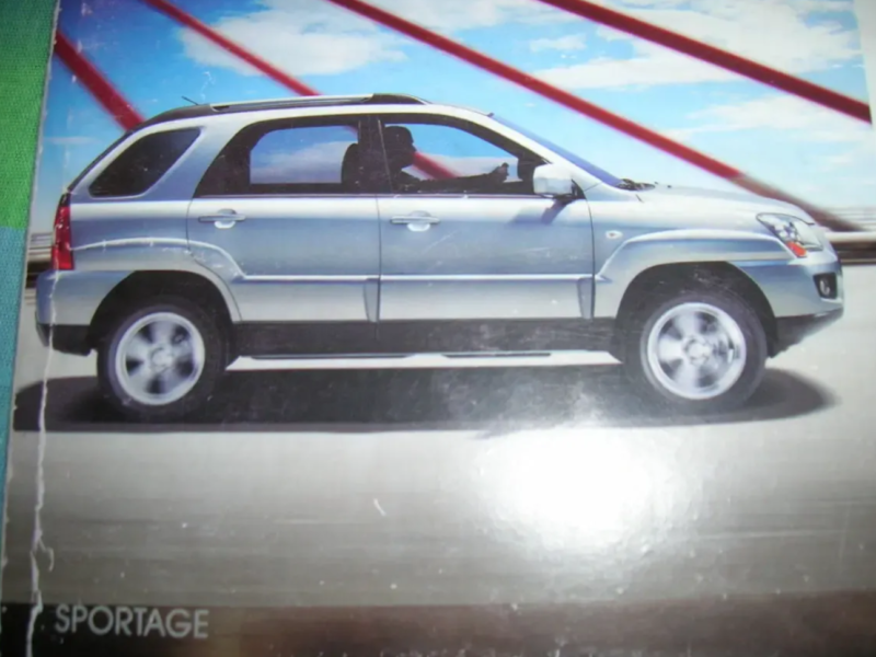 Дверь КИА-Спортейдж 2009года с накладками